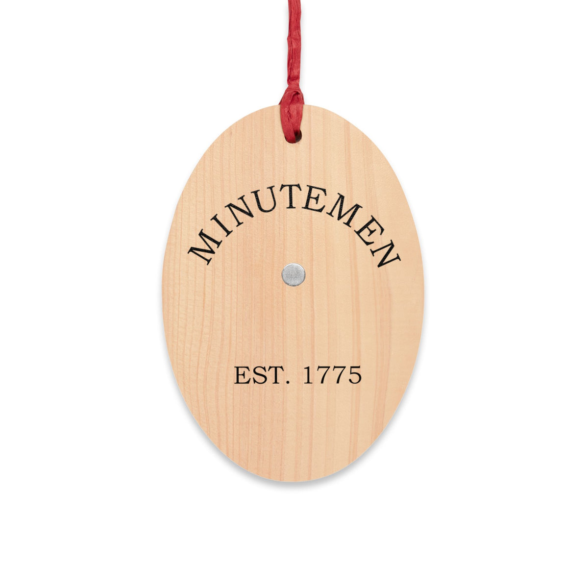 Minuteman wooden ornament, back — arched MINUTEMEN and Est. 1775 lettering on wood, magnetic center