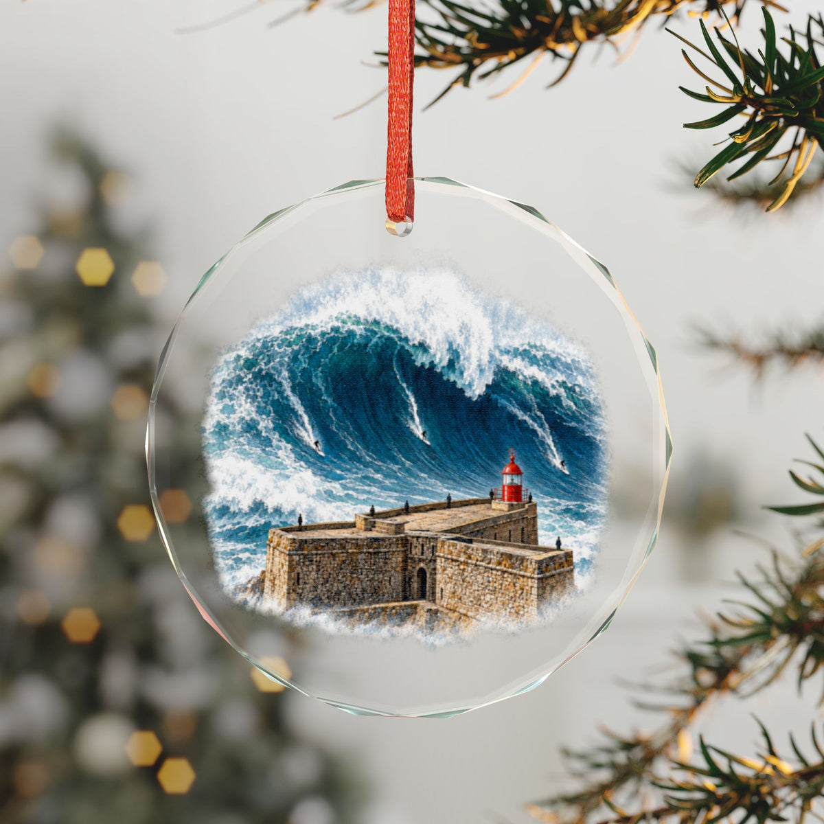 Nazaré Portugal Crystal Holiday Ornament on a Lit Tree, Giant Wave with Surfers and the Red Lighthouse